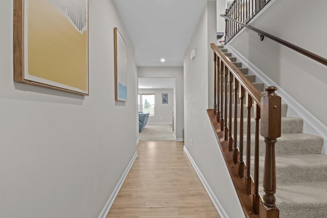 hall with light wood-type flooring