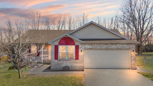 ranch-style home with a garage