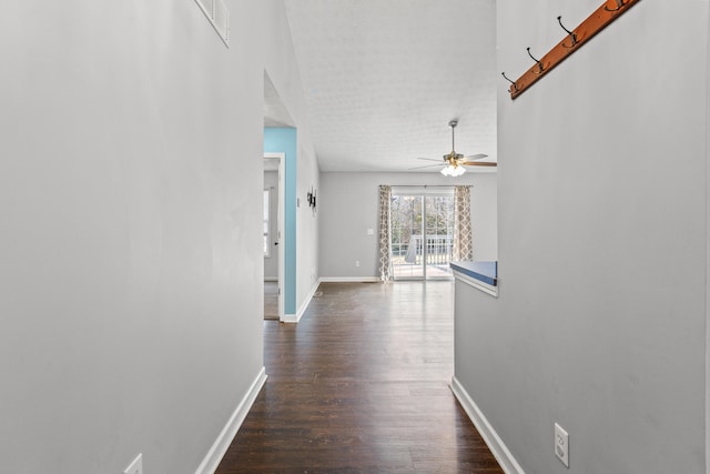 hallway featuring dark hardwood / wood-style floors