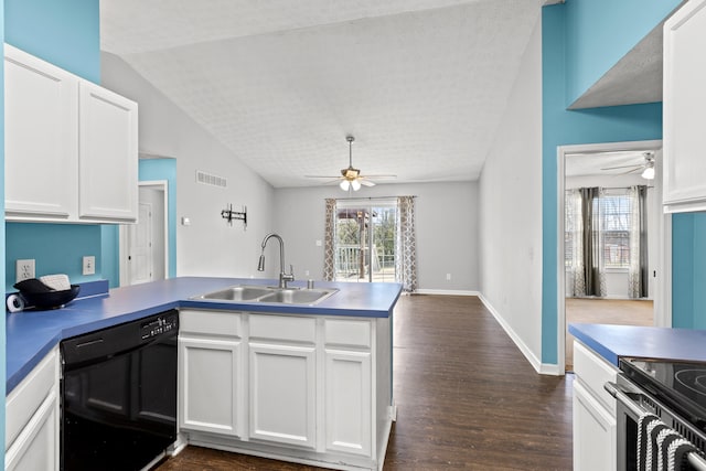 kitchen featuring white cabinetry, black dishwasher, sink, and kitchen peninsula