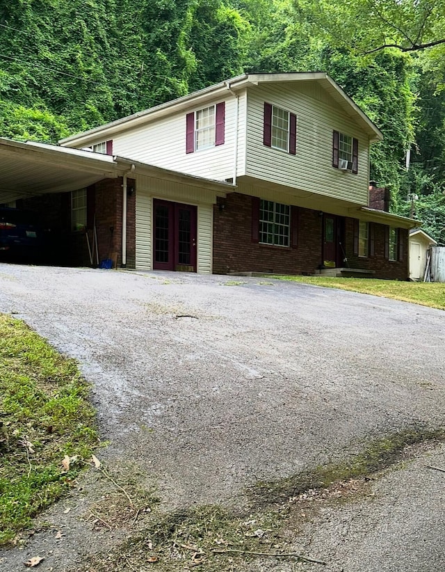 view of property featuring a carport