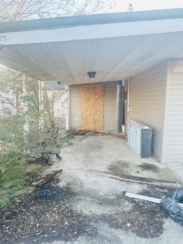 view of patio with a carport