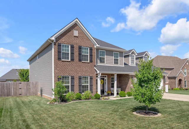 view of front facade featuring a front yard