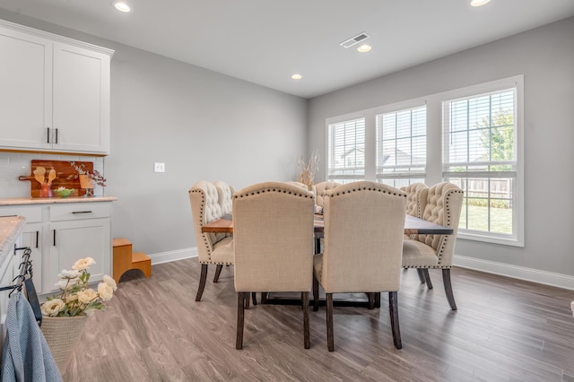 dining room featuring light hardwood / wood-style flooring