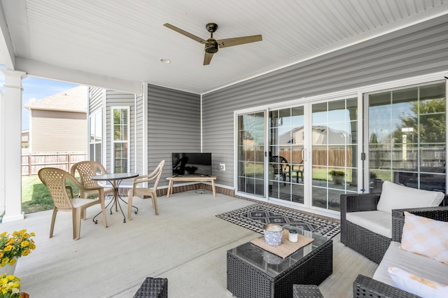 view of patio / terrace featuring an outdoor living space and ceiling fan