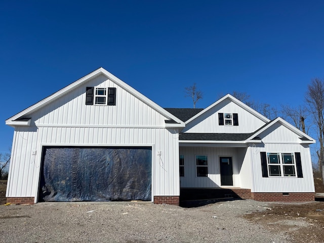 modern farmhouse with a garage