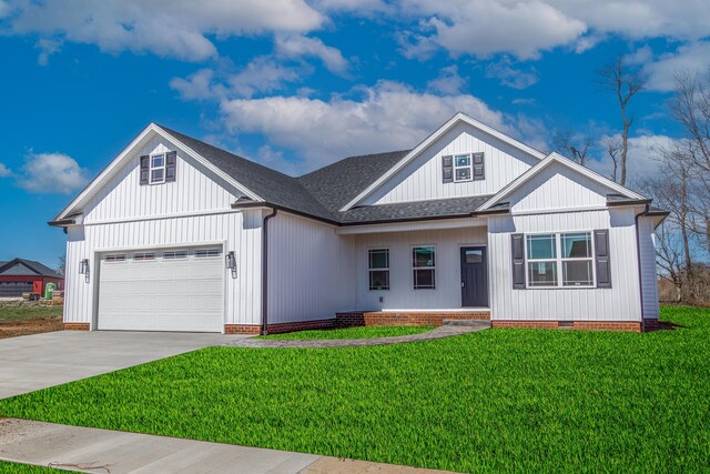 modern farmhouse style home featuring a garage