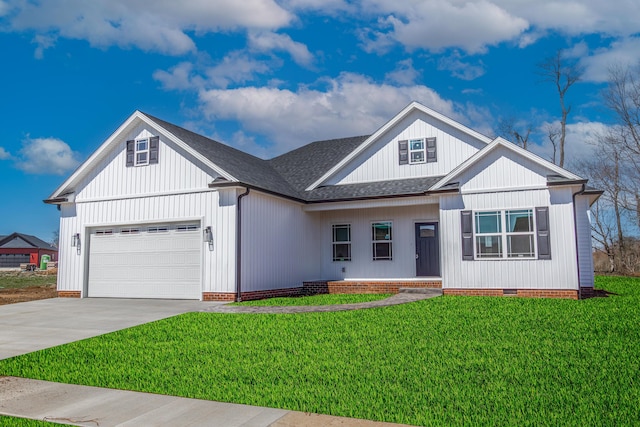 modern inspired farmhouse with concrete driveway, roof with shingles, crawl space, an attached garage, and a front lawn