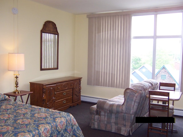 bedroom featuring baseboard heating