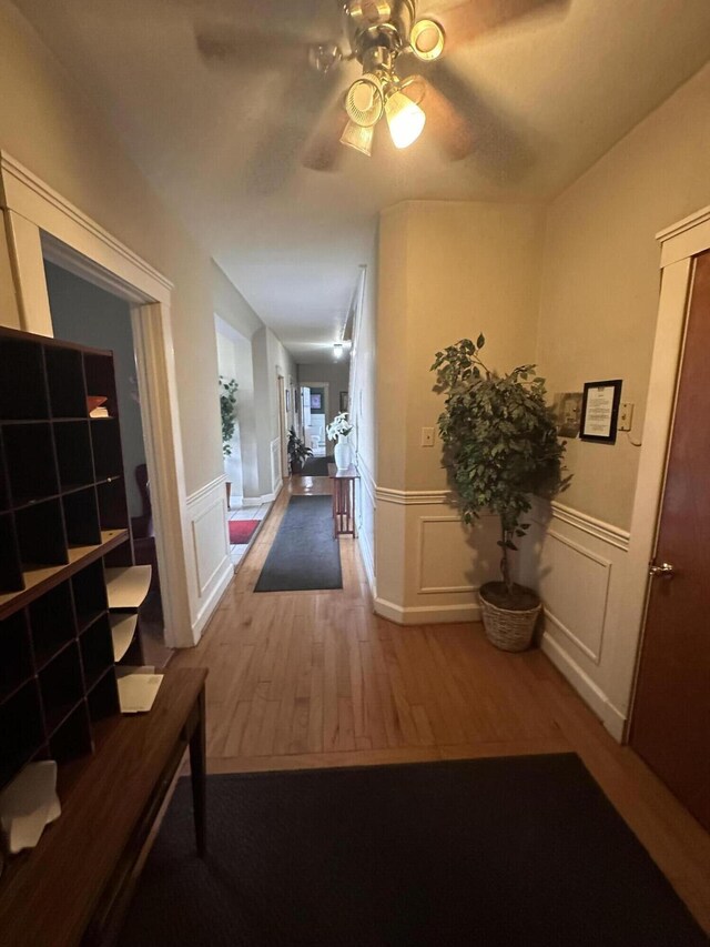 corridor featuring hardwood / wood-style flooring