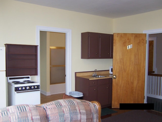 kitchen with sink and white appliances