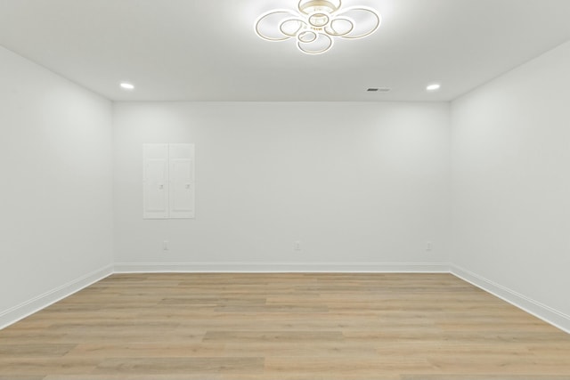 empty room with light wood-type flooring