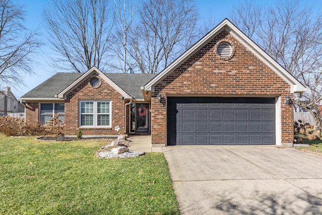 view of front of home with a garage and a front yard