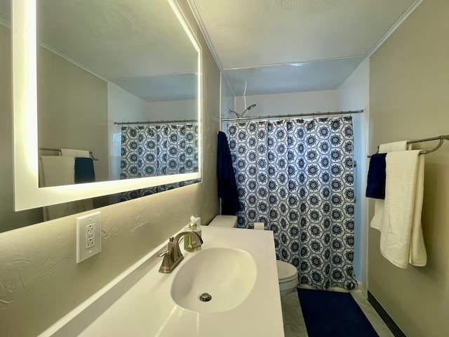 bathroom featuring vanity, a shower with shower curtain, and toilet