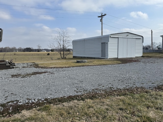 view of outbuilding with a garage