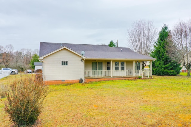 back of house featuring a porch and a yard