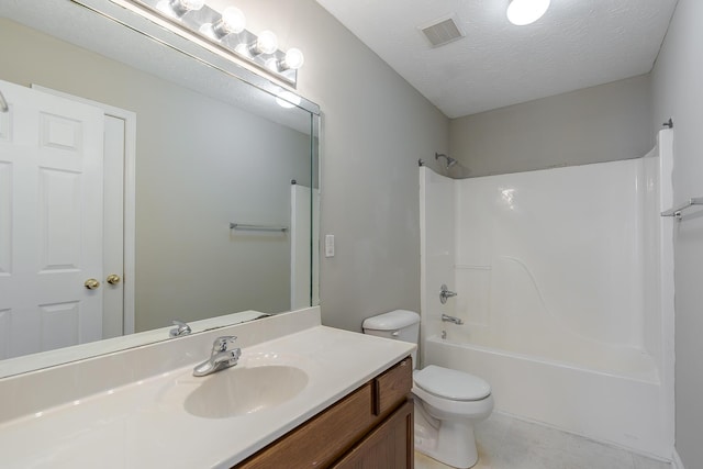 full bathroom with toilet, a textured ceiling, vanity, shower / washtub combination, and tile patterned flooring