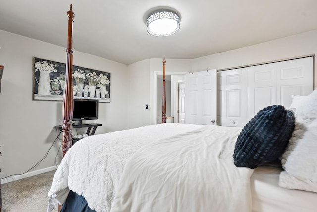 bedroom with carpet floors and a closet