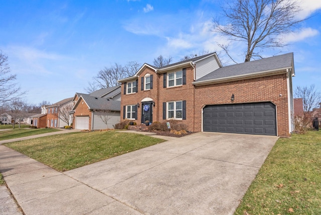 view of front of home with a garage and a front lawn