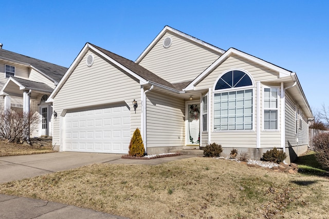 view of front of house with a garage and a front yard