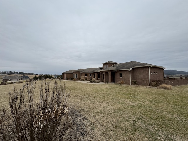 exterior space with a yard