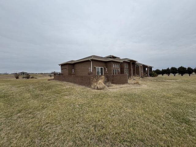 view of home's exterior featuring a lawn