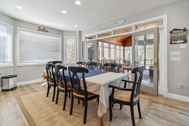 dining area with light hardwood / wood-style flooring