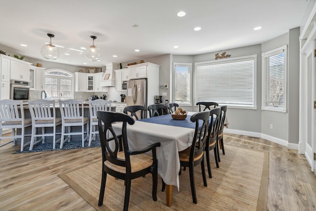 dining room with light hardwood / wood-style floors