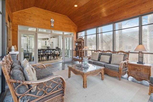 sunroom featuring vaulted ceiling and wooden ceiling