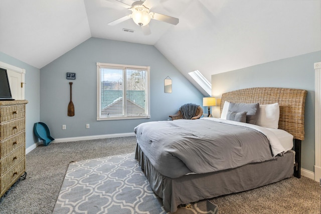 bedroom with ceiling fan, vaulted ceiling, and carpet