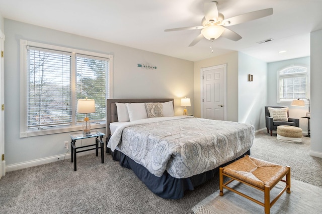 carpeted bedroom featuring ceiling fan