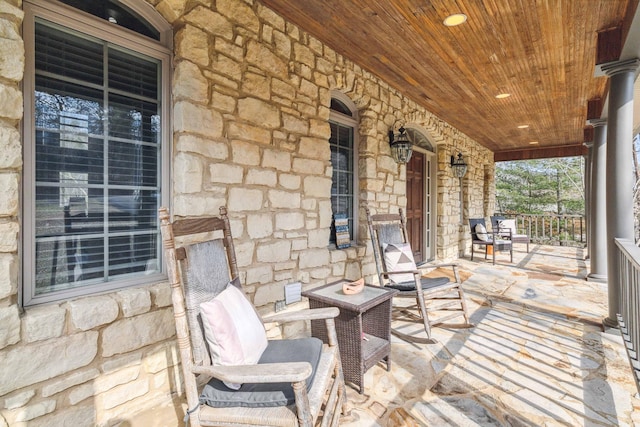 view of patio featuring a porch