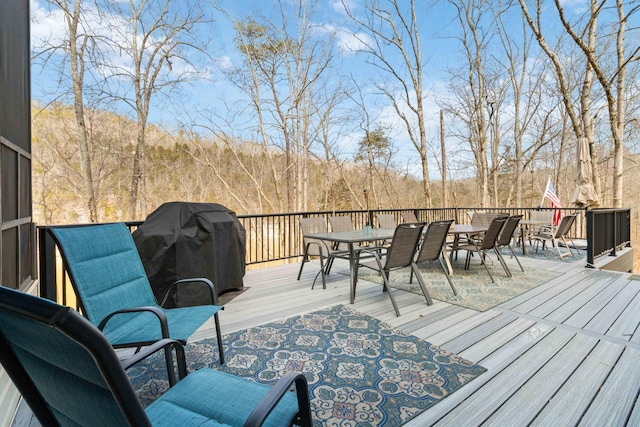 wooden deck with area for grilling