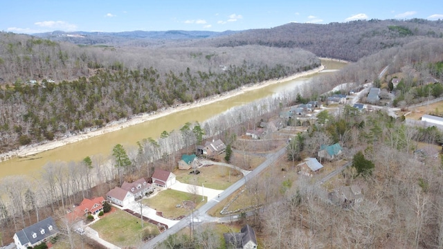 bird's eye view with a water and mountain view