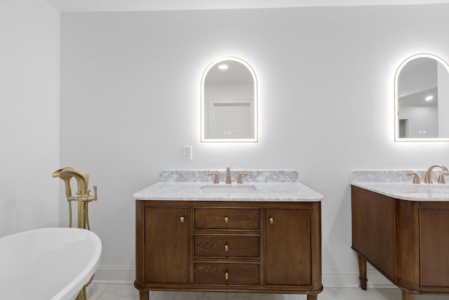 bathroom featuring vanity and a bathtub