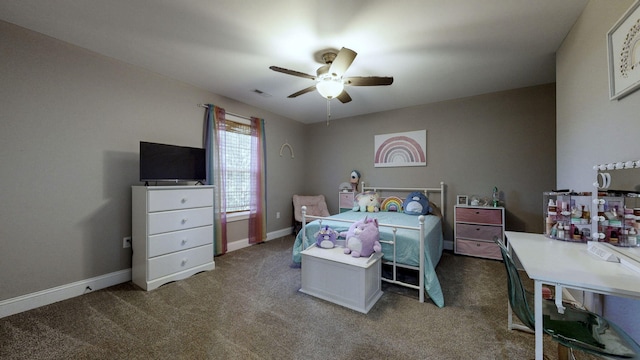 bedroom with ceiling fan and carpet flooring