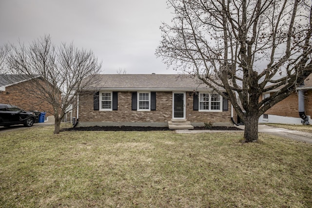 ranch-style house with a front yard