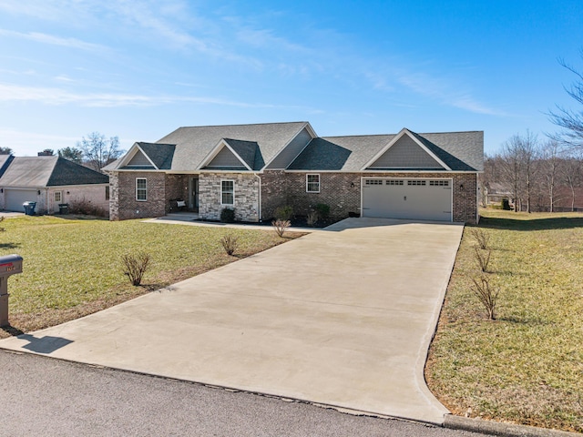 view of front facade with a garage and a front lawn