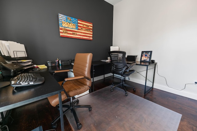 home office with dark wood-type flooring