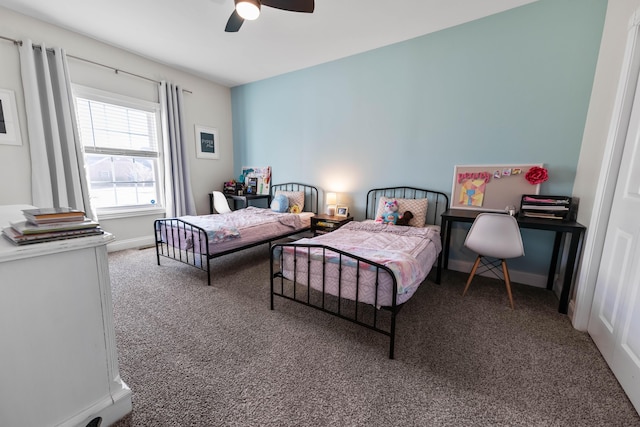 bedroom with ceiling fan and carpet floors