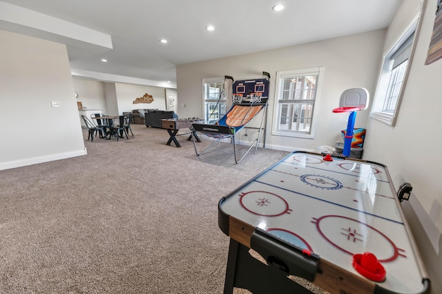 rec room featuring a wealth of natural light and carpet