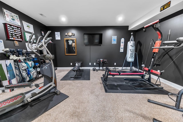 exercise area featuring carpet flooring