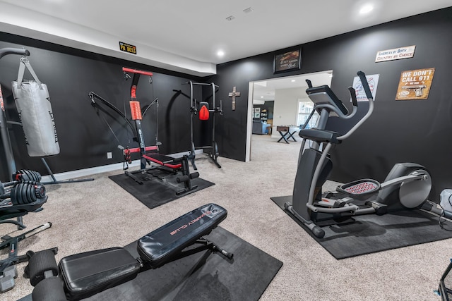 workout area featuring carpet