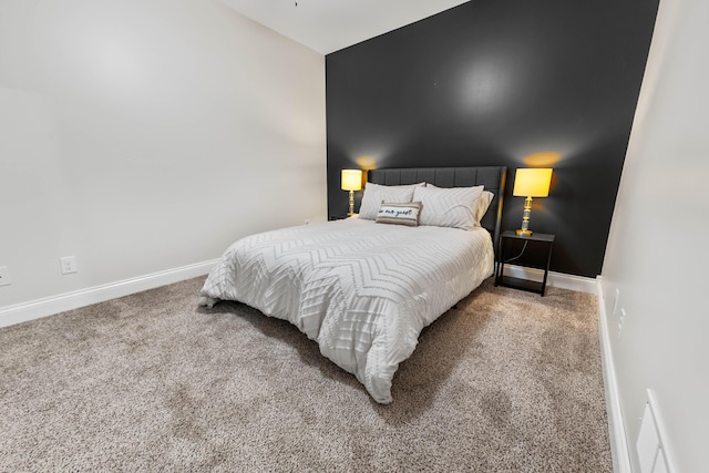 bedroom featuring carpet