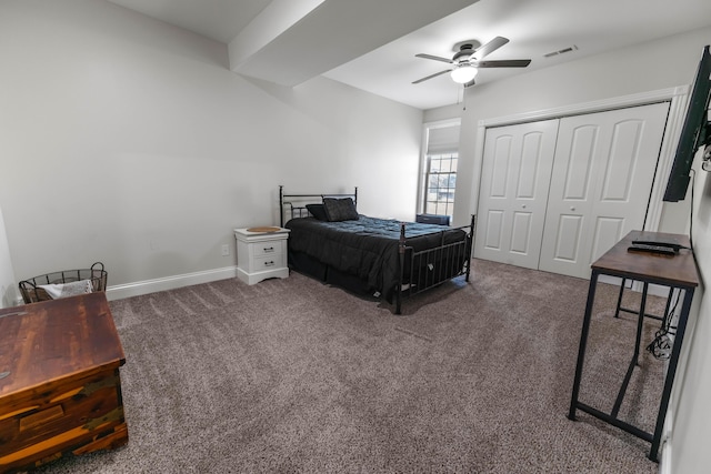 carpeted bedroom with a closet and ceiling fan