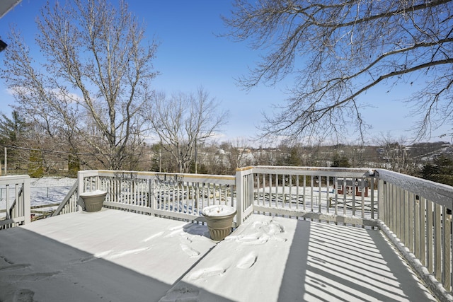 view of snow covered deck