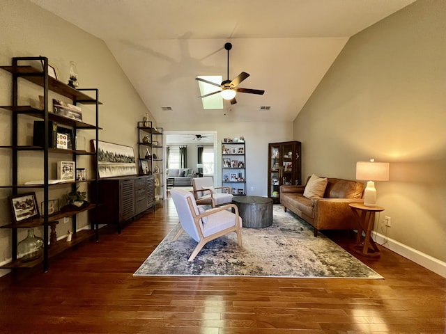 living room featuring ceiling fan, high vaulted ceiling, and dark hardwood / wood-style flooring