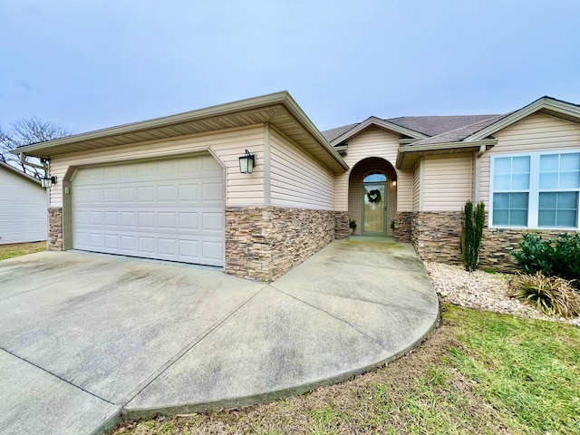 single story home with a garage