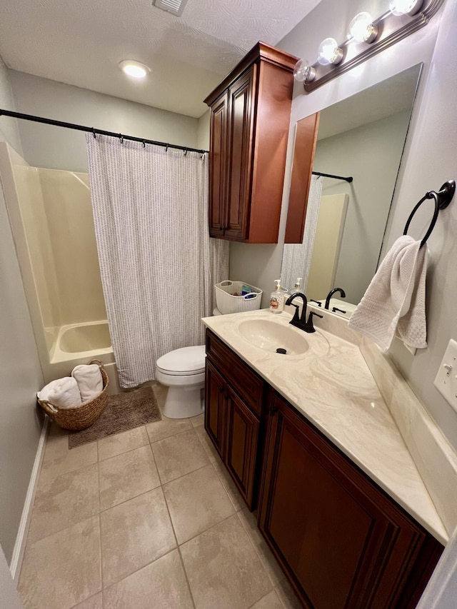 full bathroom featuring shower / tub combo with curtain, vanity, toilet, tile patterned floors, and a textured ceiling