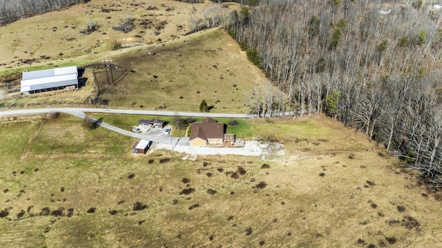 birds eye view of property featuring a rural view